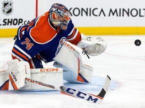 The Edmonton Oilers' goalie Stuart Skinner (74) makes a save against the Philadelphia Flyers during second period NHL action at Rogers Place in Edmonton on Feb. 21, 2023.