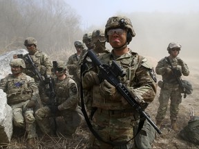 U.S. soldiers from the 2nd Infantry Division participate in a field artillery battalion gun raid exercise as a part of joint Freedom Shield (FS) exercise with South Korean soldiers at Rodriguez Range on March 19, 2023 in Pocheon, South Korea.