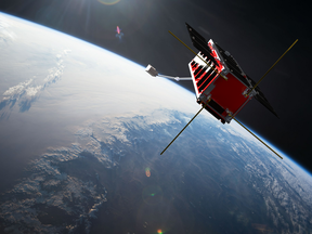 A rendering of a cube satellite orbiting Earth. University of Alberta students have built a satellite that will be launched into space and orbit the planet to monitor wildfire activity.