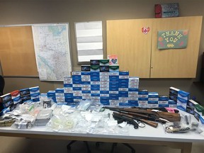 Mounties from Barrhead, Swan Hills and the Parkland RCMP dog unit executed a search warrant in Barrhead on March 15 after a lengthy investigation into drug trafficking activity connected to two homes in the area.