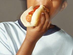 A neighbour didn't like a boy who is Black selling hot dogs and called the police.