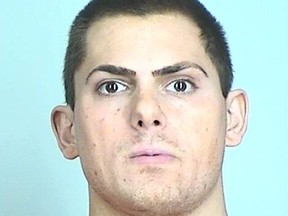 Anton Lazzaro is pictured in a booking photo.