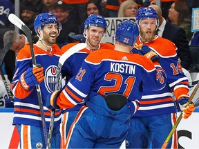 Mar 1, 2023; Edmonton, Alberta, CAN; The Edmonton Oilers celebrate a goal scored by forward Connor McDavid (97), his second of the game during the first period against the Toronto Maple Leafs at Rogers Place. Mandatory Credit: Perry Nelson-USA TODAY Sports