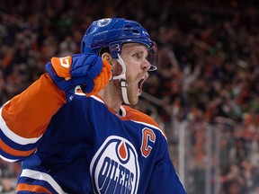 The Edmonton Oilers' Connor McDavid (97) celebrates a goal against the Dallas Stars during third period NHL action at Rogers Place in Edmonton, March 16, 2023.