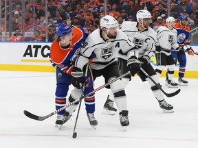 Drew Doughty #8 of the Los Angeles Kings battles with Kailer Yamamoto #56 of the Edmonton Oilers in overtime in Game One of the First Round of the 2023 Stanley Cup Playoffs on April 17, 2023 at Rogers Place in Edmonton, Alberta, Canada.