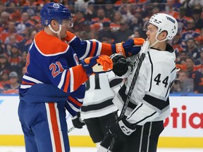 Klim Kostin #21 of the Edmonton Oilers battles with Mikey Anderson #44 of the Los Angeles Kings in the first period in Game Two of the First Round of the 2023 Stanley Cup Playoffs on April 19, 2023 at Rogers Place in Edmonton, Alberta, Canada.
