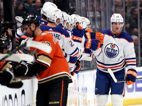 ANAHEIM, CALIFORNIA - APRIL 05: Klim Kostin #21 of the Edmonton Oilers is congratulated at the bench after scoring a goal during the second period of a game against the Anaheim Ducksat Honda Center on April 05, 2023 in Anaheim, California.