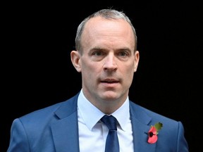 British Deputy Prime Minister and Justice Secretary Dominic Raab walks outside Number 10 Downing Street, in London, Nov. 8, 2022.