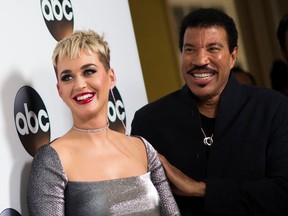Singers/Songwriters Katy Perry (L) and Lionel Richie attend the Disney ABC Television TCA Winter Press Tour on January 8, 2018, in Pasadena, California. (Photo credit: VALERIE MACON/AFP via Getty Images)