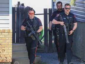 Calgary police contain the scene of a shooting in the 100 block of Martindale Blvd. N.E. after three people were shot on Saturday, April 29, 2023.