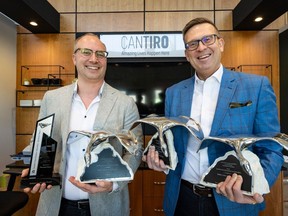 Cantiro Homes president Ryan Smith, left, and COO Jodie Wacko with their awards from Canadian Home Builders' Association-Edmonton Region.