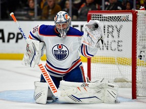 Edmonton Oilers goaltender Jack Campbell makes a glove save against the Anaheim Ducks during the second period at Honda Center in Anaheim, Calif., on April 5, 2023.