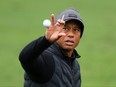 Tiger Woods catches a ball in a practice area during the third round of the 2023 Masters Tournament at Augusta National Golf Club on April 8, 2023 in Augusta, Ga.