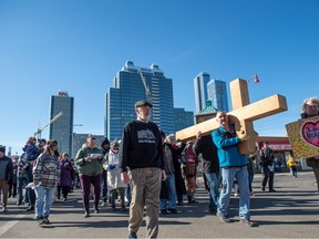 The 43rd edition of the Outdoor Way of the Cross, an annual Easter celebration, walks up 100 street from 105 Ave in the heart of the roughest part of Edmonton on April 7. Cam Tait reminds us to carry Easter's message of hope through the year.