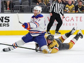 Alex Pietrangelo (7) of the Vegas Golden Knights crashes into Connor McDavid (97) of the Edmonton Oilers in Game 2 of the second round of the 2023 Stanley Cup playoffs at T-Mobile Arena on May 6, 2023, in Las Vegas, Nevada.