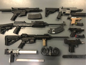Police seized eight firearms, including two prohibited handguns, four prohibited semi-automatic rifles, a prohibited fully automatic submachine gun and a prohibited semi-automatic UZI submachine pistol, plus 11 prohibited devices, including over-capacity magazines and a functioning suppressor, during a search of a residence in southwest Edmonton by the EPS gang suppression team May 11.