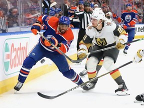 Oilers forward Evander Kane, left, was battling through injuries in Round Two against the Golden Knights. Lawrence Scott/Getty Images