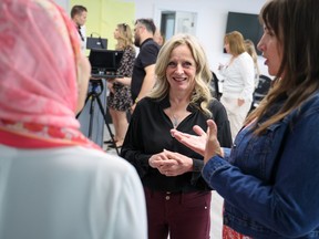 NDP Leader Rachel Notley announces her party's plan to attract more frontline health care workers to the province during a campaign stop in Calgary on Saturday, May 13, 2023.