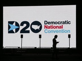 A screen in front of Frawley Stadium is emblazoned with the convention logo outside the Chase Center on the Riverfront Tuesday night as the Wilmington, Delaware complex is set to play host to key elements of the Democratic National Convention.