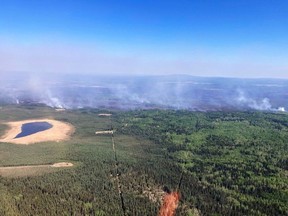 Smoke seen from wildfire EWF-035, located three kilometres from Shining Bank. The wildfire was detected on May 5, 2023. Photo supplied by Alberta Wildfire.
