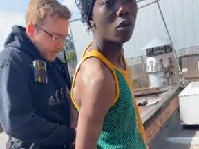 TikTok prankster Mizzy, right, getting arrested on May 26, 2023.