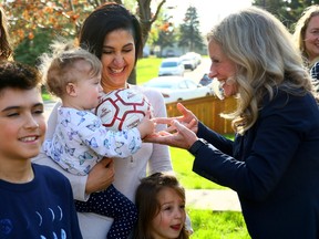 Rachel Notley joined Alberta NDP Calgary-Glenmore candidate Nagwan Al-Guneid and other parents to announce a major program to support kids sports and activities and make life more affordable for parents at a home in Calgary on Tuesday, May 9, 2023. Darren Makowichuk/Postmedia