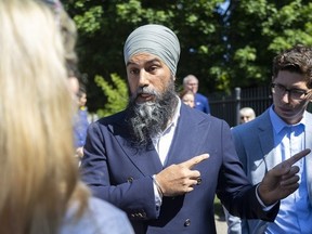 NDP Leader Jagmeet Singh is shown with Oxford NDP candidate Cody Groat during a Friday meeting in London.