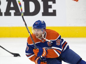 The Edmonton Oilers' Connor McDavid takes part in the pre-game skate during the team's Pride Night.