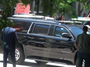 A vehicle, with former U.S. President Donald Trump on board, arrives at Wilkie D. Ferguson Jr. U.S. Federal Courthouse in Miami, Tuesday, June 13, 2023.