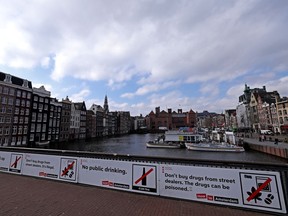 A general view of the city centre including the Red Light District, also called "De wallen" (the walls) by locals and some street signs with 'Geen alcohol op straat' or No alcohol in the street, 'Don't buy drugs from street dealers It's illegal', 'No public drinking' and Don't buy drugs from street dealers. (Photo by Dean Mouhtaropoulos/Getty Images)