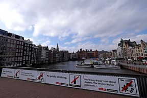 A general view of the city centre including the Red Light District, also called "De wallen" (the walls) by locals and some street signs with 'Geen alcohol op straat' or No alcohol in the street, 'Don't buy drugs from street dealers It's illegal', 'No public drinking' and Don't buy drugs from street dealers. (Photo by Dean Mouhtaropoulos/Getty Images)