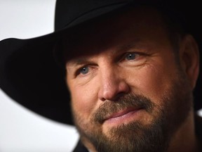 In this file photo taken on February 08, 2019, US country singer Garth Brooks arrives for the 2019 MusiCares Person Of The Year gala at the Los Angeles Convention Center in Los Angeles.