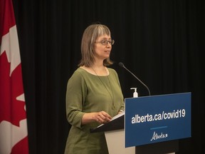 Chief medical officer of health Dr. Deena Hinshaw provides a COVID-19 update in Edmonton, Friday, Sept. 3, 2021. More than 100 Alberta doctors have signed an open letter to express their concern about a decision to revoke a job offer to the province's former chief medical officer of health.