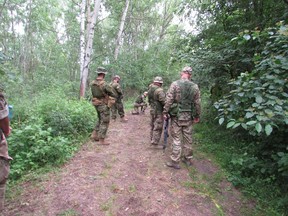 Ukrainian soldiers practice searching for IEDs under the watchful eye of Canadian trainers in southwestern Poland on Monday, June 19, 2023.