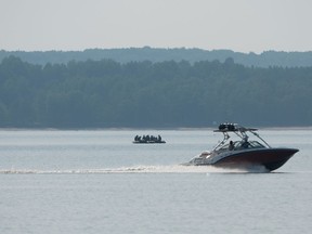 Canadian Armed Forces members search around a series of islands on the Ottawa River on Tuesday, June 20, 2023.