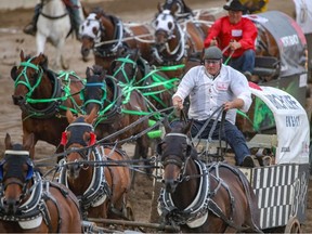 Jason Glass wins Heat 4 of the Rangeland Derby during the Calgary Stampede on Monday, July 10, 2023.