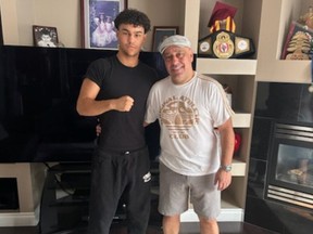 Ethan Halabi (left) and his father Joe at their Edmonton home.
