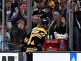 Patrice Bergeron of the Boston Bruins exits the ice after Florida Panthers defeat the Bruins in overtime of Game 7.