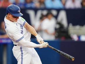 Blue Jays third baseman Matt Chapman hits a solo home run against the Angels during second inning action in Toronto on Friday, July 28, 2023.