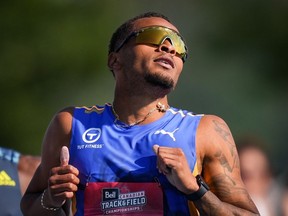 Andre De Grasse reacts after racing in the 100-metre semi-final event at the Canadian track and field championships in Langley, B.C., on Friday, July 28, 2023. De Grasse failed to qualify for the final.