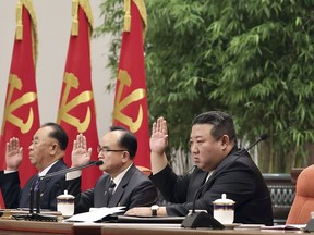 North Korean leader Kim Jong Un, centre, attends a meeting of the ruling Workers' Party's Central Committee, which was held last month at the party's headquarters in Pyongyang.