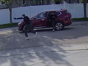 Suspect vehicle from Saturday, June 24, 2023 when a man was out for an early-evening walk with his young family. A red Nissan Rogue pulled up behind them on Ormsby Crescent and two masked suspects ran from the vehicle and began chasing the man while firing multiple gunshots at him.
