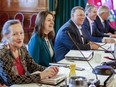 Caroline Cochrane, Premier of the Northwest Territories, from left, Danielle Smith, Premier of Alberta, Dennis King, Premier of Prince Edward Island, Tim Houston, Vice-Chair, Council of the Federation, Premier of Nova Scotia, and Doug Ford, Premier of Ontario, attend the Council of the Federation Canadian premiers meeting at The Fort Garry Hotel in Winnipeg, Tuesday, July 11, 2023. Smith says improving health care is not just a matter of money and transfers from Ottawa to the provinces.