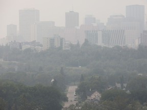 Downtown Edmonton is shrouded by wild fire smoke, Thursday, July 13, 2023.