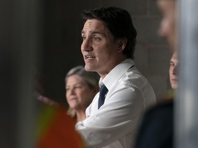 Prime Minister Justin Trudeau speaks during a visit to an apartment complex under construction in Hamilton, Ont., Monday, July 31, 2023.