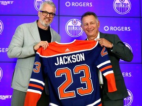 New CEO of hockey operations for the Edmonton Oilers Jeff Jackson and Oilers' general manager and president of hockey operations Ken Holland pose for a photo during a news conference to announce Jackson's hiring at Rogers Place in Edmonton on Thursday Aug. 3, 2023.