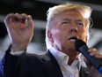 Republican presidential candidate former President Donald Trump speaks to supporters during a visit to the Iowa State Fair, Saturday, Aug. 12, 2023, in Des Moines, Iowa.