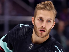 Alex Wennberg #21 of the Seattle Kraken warms up before the game against the Ottawa Senators at Climate Pledge Arena on March 09, 2023 in Seattle, Washington.