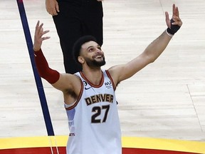 Jamal Murray of the Denver Nuggets celebrates after his team won the 2023 NBA championship on June 12, 2023 in Denver.