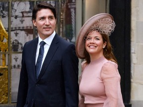 Canadian Prime Minister Justin Trudeau and his wife Sophie arrive at Westminster Abbey in central London on May 6, 2023, ahead of the coronations of Britain's King Charles III and Britain's Camilla, Queen Consort.